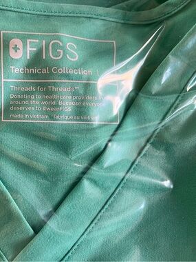 Figs V-Neck Scrub Top and cargo pants in various colors.  Sold by sets only.